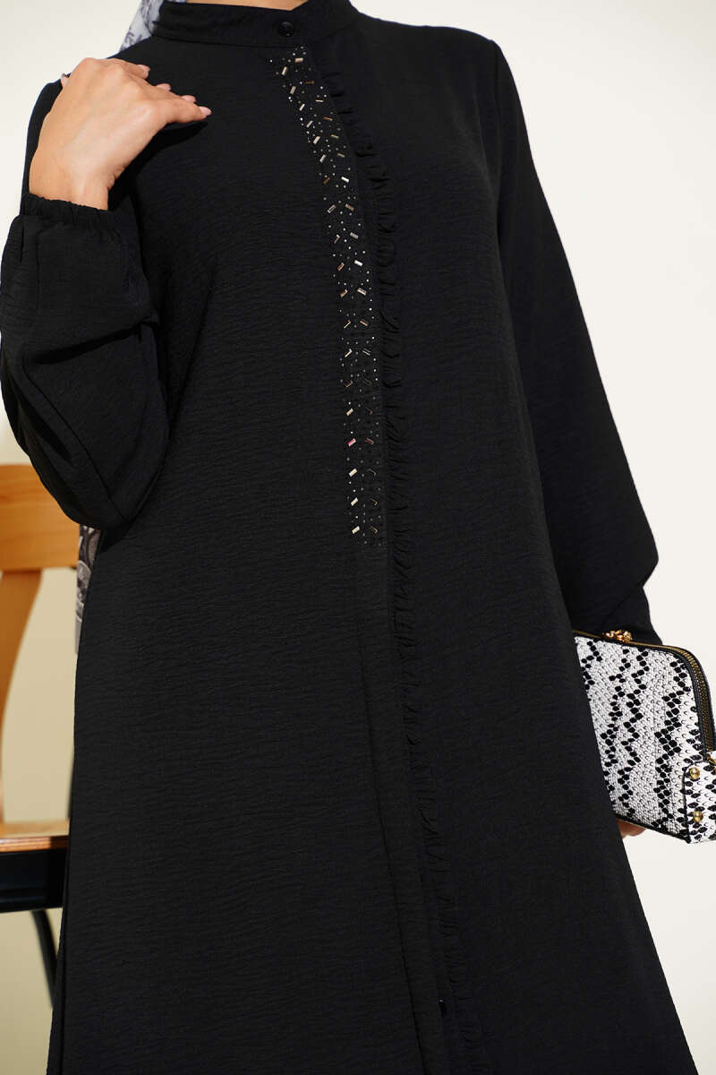 Black Two-piece set with ruffled front and silver stone detail.